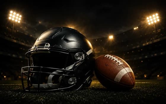 American football helmet and ball in a stadium